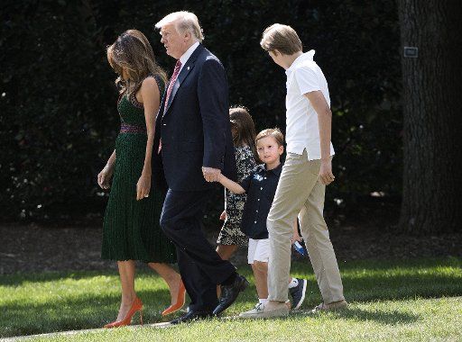 President Donald Trump the First Lady Melania Trump, their son Barron and Trump\