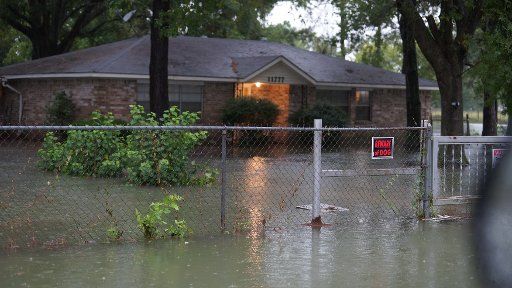 Water is flooding this home as Hurricane Harvey was downgraded to a Tropical Storm, in Houston, Texas on August 27, 2017. Photo by Jerome Hicks\/