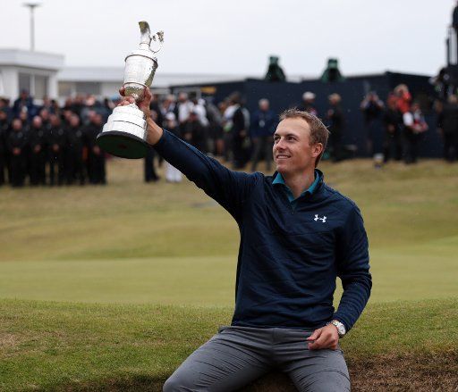 American Jordan Spieth holds the Claret jug after victory at the 146th Open Championship at Royal Birkdale Golf Club, Southport on July 23, 2017. Spieth won in a combined score of 268, twelve under par. Photo by Hugo Philpott\/