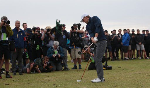 American Jordan Spieth practices a shot on the 13th hole on the final day of the 146th Open Championship at Royal Birkdale Golf Club, Southport on July 23, 2017. Spieth beat Kuchar with a combined score of 268, twelve under par. Photo by Hugo ...