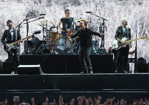 U2 members (From L to R) The Edge, Larry Mullen Jr, Bono and Adam Clayton perform in concert at the Stade de France near Paris on July 25, 2017. Photo by David Silpa\/