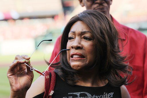 Singer Mary Wilson of the Supremes stands on the field before the Colorado Rockies-St. Louis Cardinals baseball game at Busch Stadium in St. Louis on July 24, 2017. Photo by Bill Greenblatt\/
