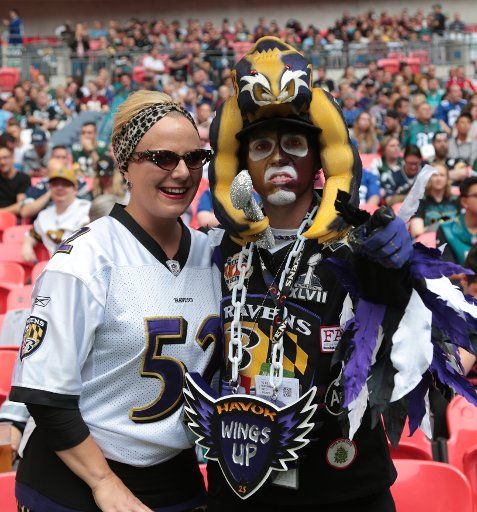 Baltimore Ravens fans pose for the camera in the NFL International Series match against the Jacksonville Jaguars at Wembley Stadium, London on September 24, 2017. Jacksonville beat Baltimore 44 - 7. Photo by Hugo Philpott\/