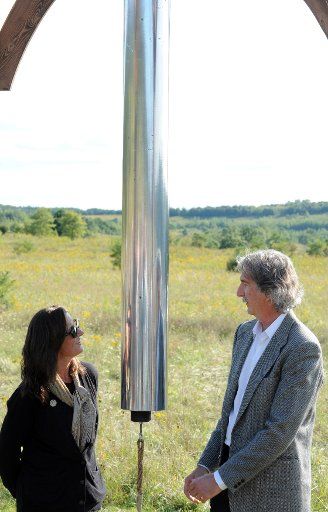 Paul Murdoch, Architect of the Flight 93 Memorial explains the prototype of one of the chines followng the Soundbreaking at the future site of the Tower of Voices, a 93 feet tall tower of 40 chimes, near the entrance of Flight 93 National Memorial ...