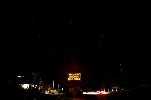 Just days following Hurricane Irma, a sign reading "Recovery Underway Drive Safe" is seen upon entering San Marco Island just south of Naples, Florida on September 12, 2017. Irma struck San Marco Island straight on as well as the west coast ...