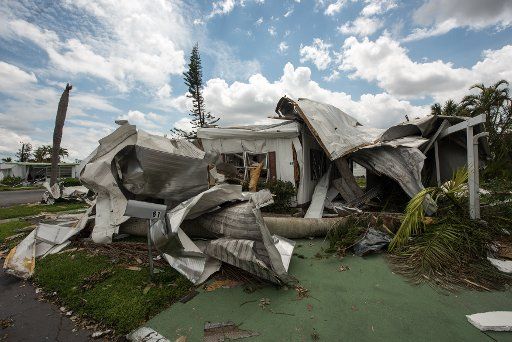 Debris from destroyed mobile homes lay in the yards after Hurricane Irma in Naples Estates Mobile Home Park in Naples, Florida on September 13, 2017. President Trump will be visiting this mobile home park later today, September 14. Naples got hit ...