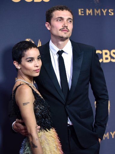 Actor Zoe Kravitz (L) Karl Glusman arrive for the 69th annual Primetime Emmy Awards at Microsoft Theater in Los Angeles on September 17, 2017. Photo by Christine Chew\/