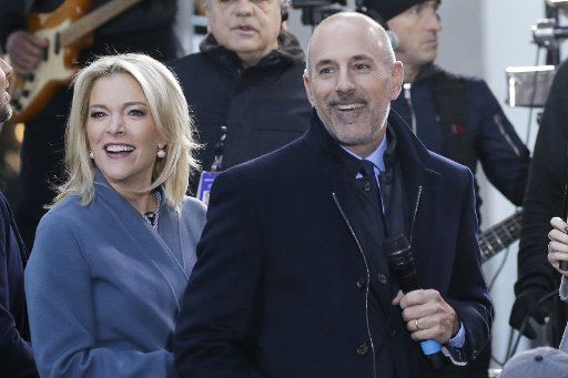 Show hosts Megyn Kelly and Matt Lauer smile on stage when Faith Hill and Tim McGraw perform on the NBC Today Show at Rockefeller Center in New York City on November 17, 2017. Photo by John Angelillo\/