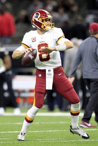 Washington Redskins quarterback Kirk Cousins (8) warms up before the game with the New Orleans Saints at the Mercedes-Benz Superdome in New Orleans November 19, 2017. Photo by AJ Sisco\/