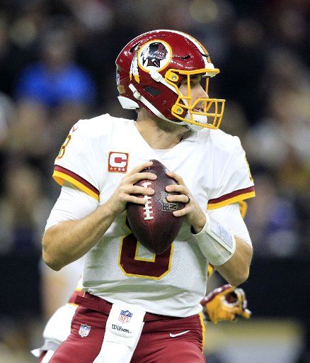 Washington Redskins quarterback Kirk Cousins (8) throws against the New Orleans Saints at the Mercedes-Benz Superdome in New Orleans November 19, 2017. Photo by AJ Sisco\/