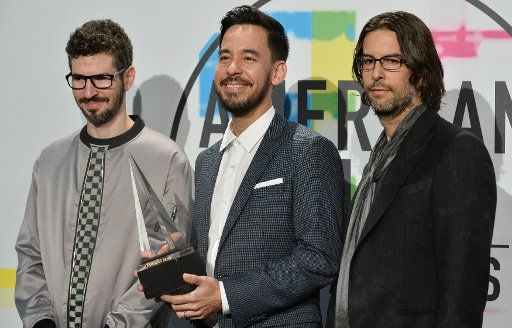 Brad Delson, Mike Shinoda and Rob Bourdon of Linkin Park backstage for their win for Favorite Artist - Alternative Rock at the annual American Music Awards held at Microsoft Theater in Los Angeles, on November 19, 2017. Photo by Jim Ruymen\/
