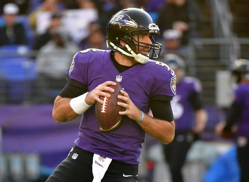 Baltimore Ravens quarterback Joe Flacco (5) looks to pass against the Detroit Lions in the first quarter at M&T Bank Stadium on December 3, 2017 in Baltimore, Maryland. Photo by Kevin Dietsch\/