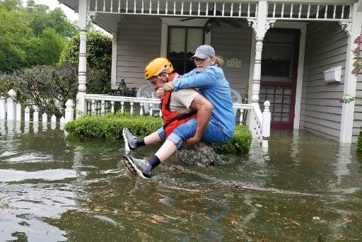 Texas National Guard soldiers conduct rescue operations in Houston, Texas, on August 27, 2017, to aid citizens in heavily flooded areas from the storms of Hurricane Harvey. More than 1200 Texas Guardsmen partnered with Emergency first responders to support hurricane rescue missions throughout the Gulf Coastal areas of Texas. Photo by Lt. Zachary West\/Texas National Guard\/