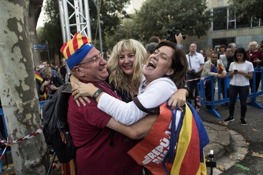 People celebrate the proclamation of a Catalan republic at the Sant Jaume Square in Barcelona in Spain, on October 27, 2017. Catalonia\