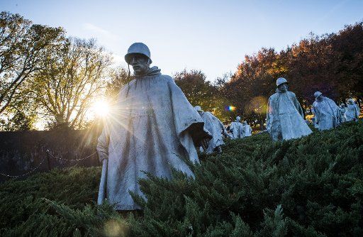 Statues at the Korean War Memorial are seen a day before Veterans Day on November 10, 2017 in Washington, D.C. Photo by Kevin Dietsch\/