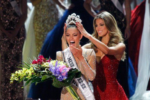 Miss South Africa, Demi-Leigh Nel-Peters is crowned Miss Universe 2017 by Iris Mittenaere during the 66th Miss Universe pageant competition at The Axis at Planet Hollywood in Las Vegas, Nevada, on November 26, 2017. Photo by James Atoa\/