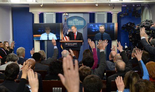 Press Secretary Sean Spicer calls on reporters in the press briefing in the Brady Press Briefing Room at the White House in Washington, D.C., on February 3, 2017. He also fielded four questions via Skype from reporters across the nation. Photo by Pat Benic\/