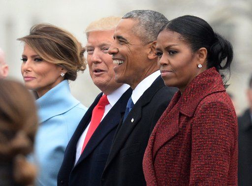 President Donald Trump (2nd-L), First Lady Melania Trump (L), former President Barack Obama (2nd-R) and former First Lady Michelle Obama walk together following the inauguration, on Capitol Hill in Washington, D.C. on January 20, 2017. Trump was sworn in as the 45th President of the United States. Photo by Kevin Dietsch\/