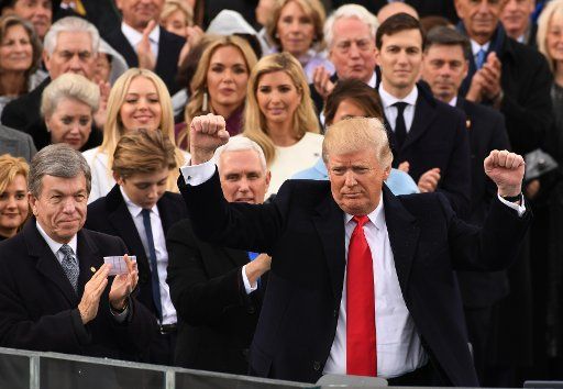 President Donald Trump gestures to the crowd after taking the Oath of Office at his inauguration on January 20, 2017, in Washington, D.C. Trump was sworn in as the 45th President of the United States. Photo by Pat Benic\/