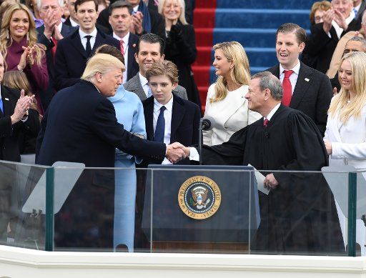 President Donald Trump shakes hands with Chief Justice John Roberts after taking the Oath of Office at his inauguration on January 20, 2017, in Washington, D.C. Trump was sworn in as the 45th President of the United States. Photo by Pat Benic\/