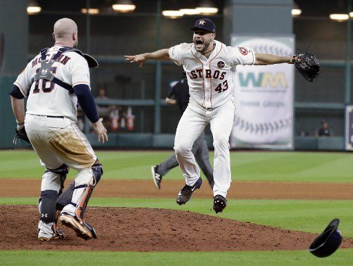Houston Astros reliever Lance McCullers, Jr. (43) celebrates with catcher Brian McCann after final out against the New York Yankees in game 7 of the American League Championship Series at Minute Maid Park in Houston, Texas on October 21, 2017. The Astros beat the Yankees 4-0 advancing to the World Series to play the Los Angeles Dodgers. Photo by John Angelillo\/