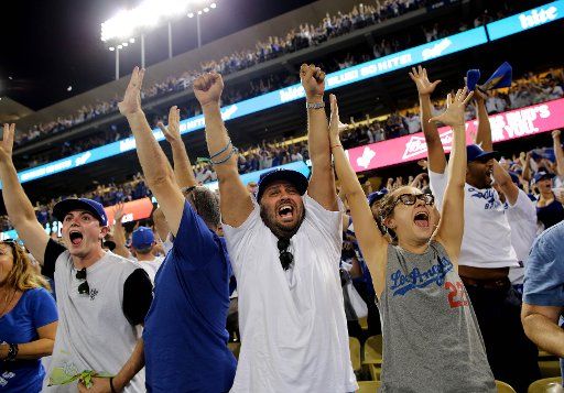 Fans celebrate Los Angeles Dodgers Justin Turner\