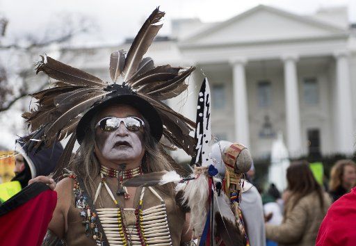Little Bear, with the Lakota tribe, joined by people of the Standing Rock Sioux Tribe, indigos right advocates and environmental activist participate in a protest against the Dakota Access Pipeline on March 10, 2017 in Washington, D.C. Activists marched to the White House in opposition of the Trump Administration\