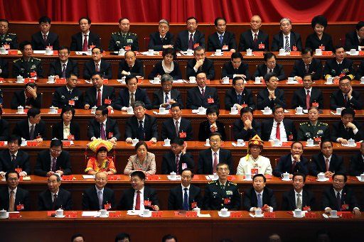 Chinese delegates attend the closing ceremony of the 19th National Congress of the Communist Party of China in the Great Hall of the People in Beijing on October 24, 2017. The Congress is held every five years and is considered the most important political meeting in China, where new leaders are chosen and new policies are discussed and implemented. Photo by Stephen Shaver\/