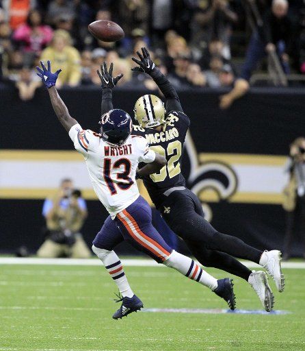 New Orleans Saints strong safety Kenny Vaccaro (32) bats the ball away from Chicago Bears wide receiver Kendall Wright (13) late in the fourth quarter at the Mercedes-Benz Superdome in New Orleans October 29, 2017. Photo by AJ Sisco\/