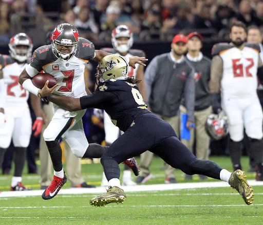 Tampa Bay Buccaneers quarterback Jameis Winston (3) is chased from the pocket by New Orleans Saints defensive end Cameron Jordan (94) in the first quarter at the Mercedes-Benz Superdome in New Orleans November 5, 2017. Photo by AJ Sisco\/