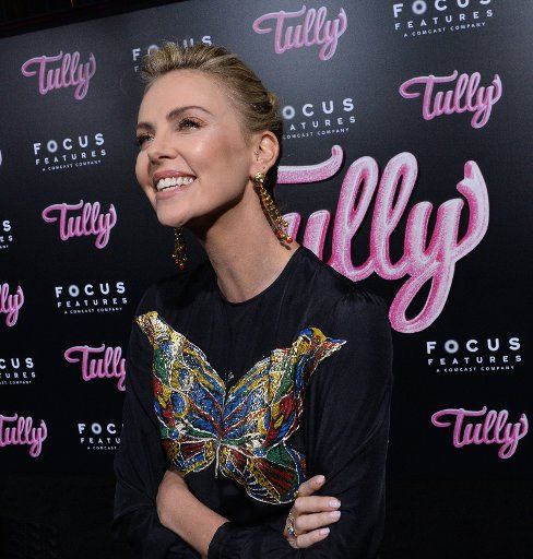 Cast member Charlize Theron attends the premiere of the dramatic comedy "Tully" at Regal Cinemas LA Live in downtown Los Angeles on April 18, 2018. Storyline: Marlo, a mother of three including a newborn, who is gifted a night nanny by her brother. Hesitant to the extravagance at first, Marlo comes to form a unique bond with the thoughtful, surprising, and sometimes challenging young nanny named Tully. Photo by Jim Ruymen\/
