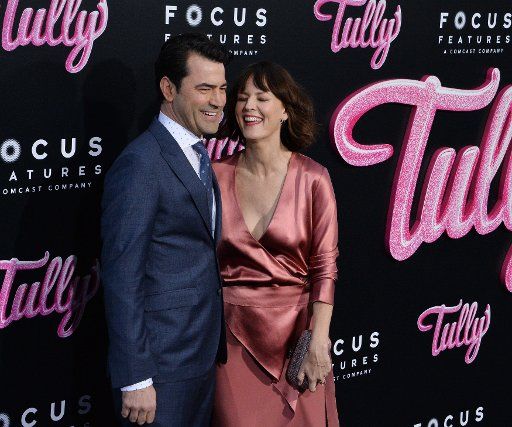 Cast member Ron Livingston (L) and his wife, actress Rosemarie DeWitt attend the premiere of the motion picture dramatic comedy "Tully" at Regal Cinemas LA Live in downtown Los Angeles on April 18, 2018. Storyline: Marlo, a mother of three including a newborn, who is gifted a night nanny by her brother. Hesitant to the extravagance at first, Marlo comes to form a unique bond with the thoughtful, surprising, and sometimes challenging young nanny named Tully. Photo by Jim Ruymen\/