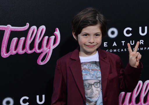 Cast member Asher Miles Fallica attends the premiere of the motion picture dramatic comedy "Tully" at Regal Cinemas LA Live in downtown Los Angeles on April 18, 2018. Storyline: Marlo, a mother of three including a newborn, who is gifted a night nanny by her brother. Hesitant to the extravagance at first, Marlo comes to form a unique bond with the thoughtful, surprising, and sometimes challenging young nanny named Tully. Photo by Jim Ruymen\/