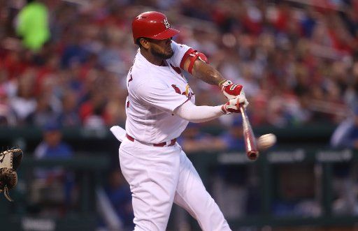 St. Louis Cardinals Jose Martinez connects for a single in the first inning against the New York Mets at Busch Stadium in St. Louis on April 24, 2018. Photo by Bill Greenblatt\/