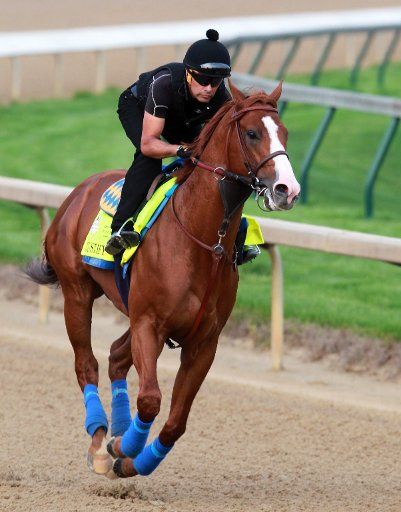 Kentucky Derby favorite Justify gallops on the track during morning workouts at Churchill Downs May 3, 2018, in Louisville, Kentucky. The 144th running of the Kentucky Derby is scheduled for Saturday, May 5. Photo by John Sommers II\/