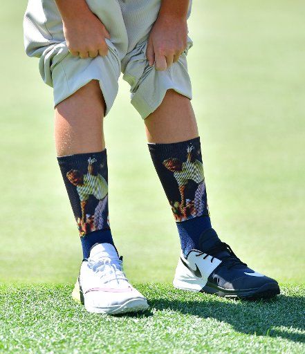 P.J. May bank III shows off his Jack Nicklaus themed socks during the Drive Chip & Putt National Finals at Augusta National Golf Club during Masters week on April 1, 2018 in Augusta, Georgia. Photo by Kevin Dietsch\/