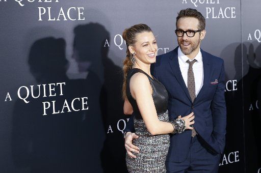 Blake Lively and Ryan Reynolds arrive on the red carpet at the premiere for \