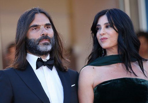 Khaled Mouzanar (L) and Nadine Labaki arrive on the red carpet before the screening of the film "Capharnaum" at the 71st annual Cannes International Film Festival in Cannes, France on May 17, 2018. Photo by David Silpa\/