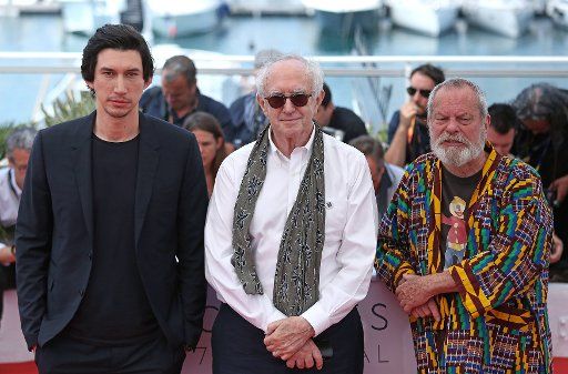 Adam Driver (L) Jonathan Pryce (C) and Terry Gilliam arrive at a photocall for the film "The Man Who Killed Don Quixote" during the 71st annual Cannes International Film Festival in Cannes, France on May 19, 2018. Photo by David Silpa\/