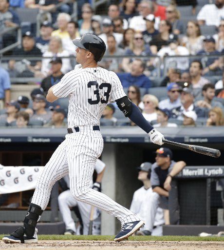 New York Yankees Greg Bird hits a grand slam home run in the first inning against the Toronto Blue Jays at Yankee Stadium in New York City on August 19, 2018. Photo by John Angelillo\/