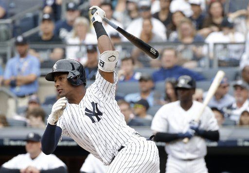 New York Yankees Miguel Andujar hits an RBI single in the first inning against the Toronto Blue Jays at Yankee Stadium in New York City on August 19, 2018. Photo by John Angelillo\/