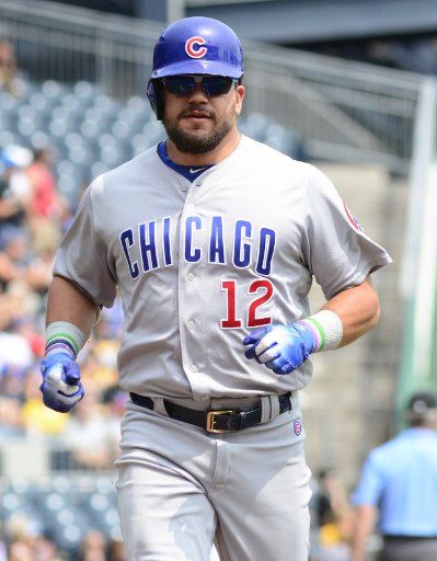 Chicago Cubs left fielder Kyle Schwarber (12) hits a solo home run in the second inning against the Pittsburgh Pirates at PNC Park on August 19, 2018 in Pittsburgh. Photo by Archie Carpenter\/