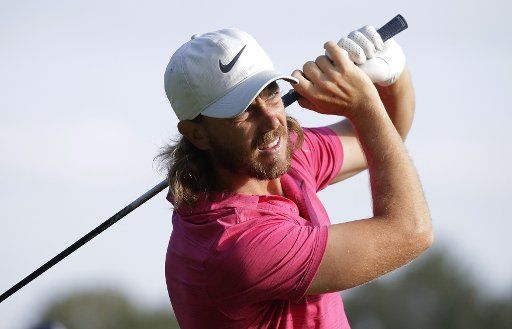 Tommy Fleetwood from England hits his tee shot on the 10th hole in the first round of The Northern Trust golf championship FedEx Cup playoffs at Ridgewood Country Club in Paramus, New Jersey on August 23, 2018. Photo by John Angelillo\/