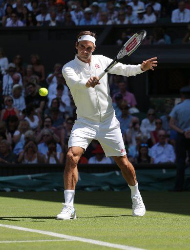 Swiss Roger Federer arrives for his match versus Serbiaâs Dusan Lajovic on the first day of the 2018 Wimbledon championships, London on July 2, 2018.Federer defeated Lajovic 6-1 6-3 6-4. Photo by Hugo Philpott\/