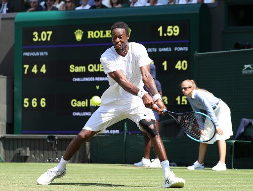 French Gail Monfils plays a backhand in his match against American Sam Querrey on the fifth day of the 2018 Wimbledon championships, London on July 6, 2018. Monfils defeated Querrey 5-7 6-4 6-4 6-2 Photo by Hugo Philpott\/