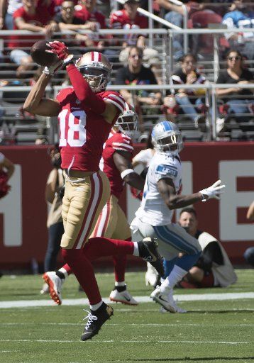 San Francico 49ers WR Dante Pettis (18) takes a Jimmy Garoppolo pass for 35 yards in the first quarter against the Detroit Lions at Levi\