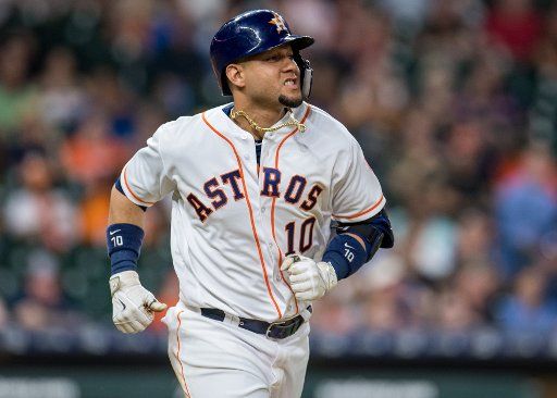 Yuli Gurriel of the Houston Astros runs to first after hitting a single against the Seattle Mariners in the 7th inning at Minute Maid Park in Houston on September 19, 2018. Photo by Trask Smith\/