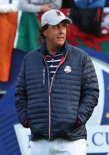 Phil Mickelson arrives on the first tee before the start of the Ryder Cup at Le Golf National in Guyancourt near Paris on September 28, 2018. Photo by David Silpa\/