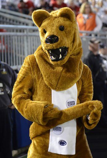 Penn State Nittany Lions mascot plays air guitar before the start of the Ohio State Buckeyes 27-26 victory at Beaver Stadium in State College , Pennsylvania on September 29, 2018. Photo by Archie Carpenter\/
