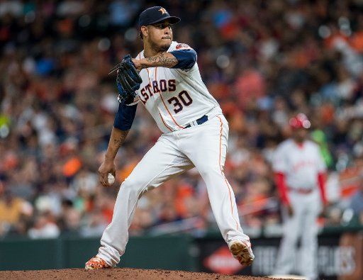 Hector Rondon of the Houston Astros pitches against the Los Angeles Angels in the 8th inning at Minute Maid Park in Houston on September 2, 2018. Photo by Trask Smith\/